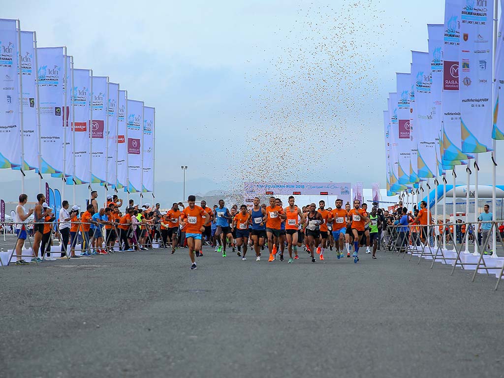 Runners leaving the start line at Fujairah Festival Square
